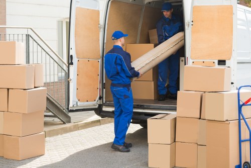 Student removals planning in Mayfair with boxes and a moving van
