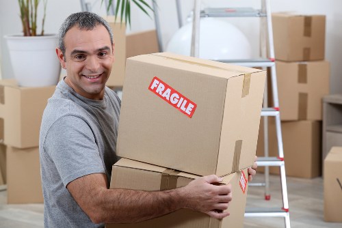 Furniture removal team handling items in a Mayfair residential property