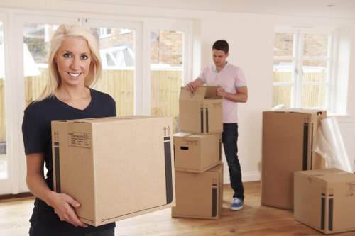 Commercial moving team handling office furniture in central London