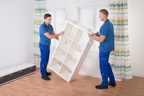 Boxes and furniture prepared for a local removal service in a Mayfair property