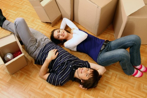 Residential moving team preparing a Mayfair home relocation with organised boxes