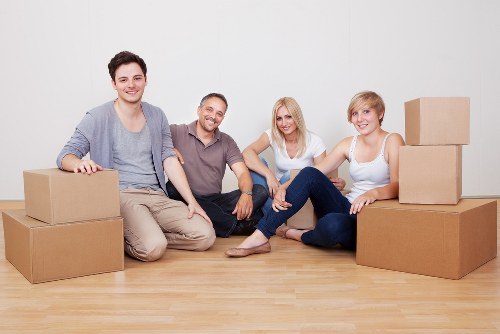 Recyclable cardboard and furniture prepared for collection by a Mayfair moving service